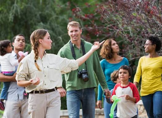 A tour guide from Travel-lite Travel Agency